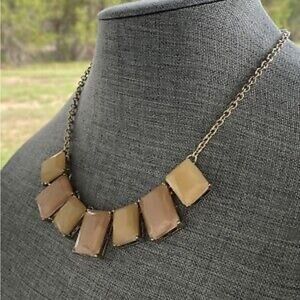 Honey toned rectangular geometric necklace. Gold chain.